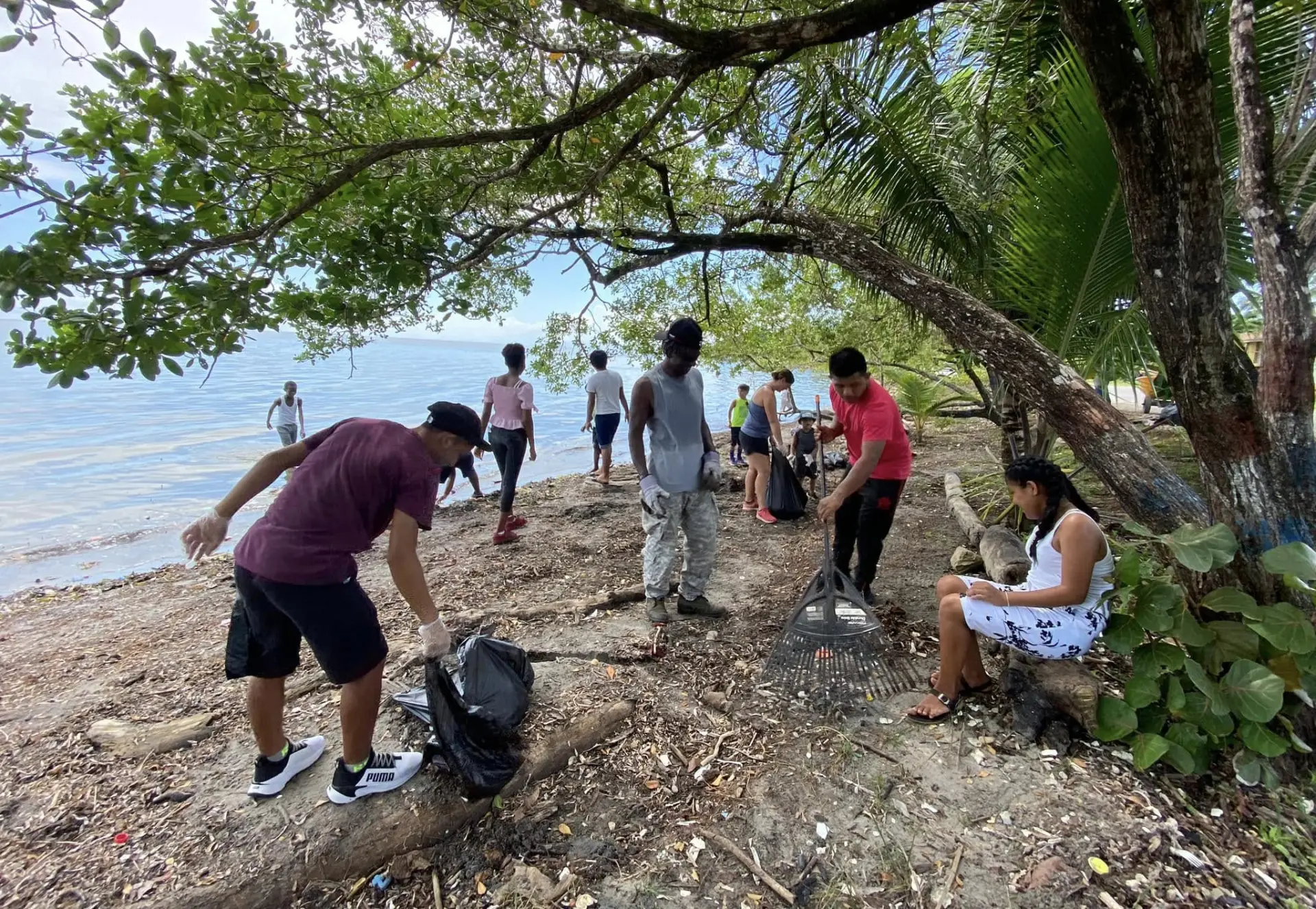 Church members cleaning the shoreline during a community outreach