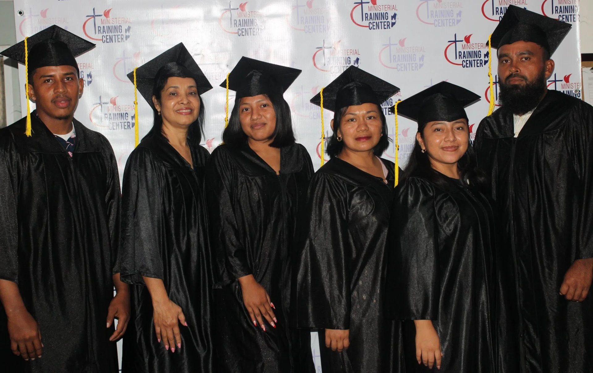Ministerial Training Center graduates in caps and gowns