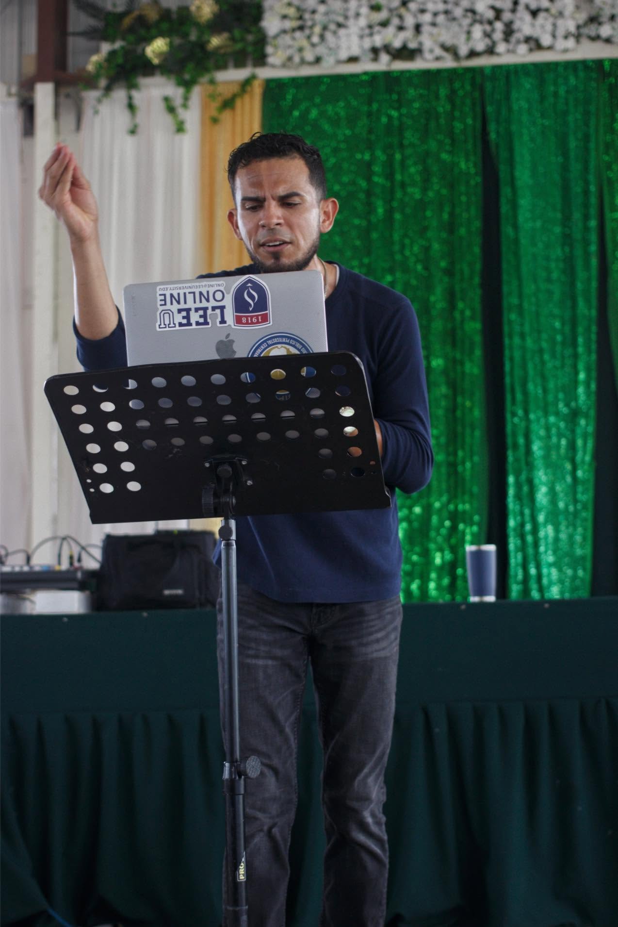 Pastor Brian Soto preaching during a Sunday service